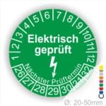 Prüfplaketten rund Farbe- Grün, Text "Elektrisch geprüft" in Weiß Startjahr- 26 mit Elektro Pfeil, Monatszahlen Oben und Jahreszahlen Unten in Kreisform