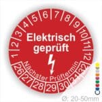 Prüfplaketten rund Farbe- Rot, Text "Elektrisch geprüft" in Weiß Startjahr- 26 mit Elektro Pfeil, Monatszahlen Oben und Jahreszahlen Unten in Kreisform