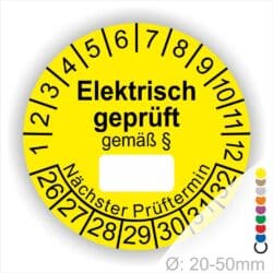 Pruefplakette mit Text Elektrisch geprüft gemäß Paragrapf als Zeichen und Beschriftungfeld zum eintragen des Paragraphs Farbe- Gelb Startjahr- 26 mit Monatszahlen Oben und Jahreszahlen Unten Form ist Rund