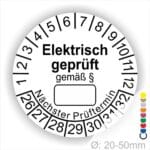 Pruefplakette mit Text Elektrisch geprüft gemäß Paragrapf als Zeichen und Beschriftungfeld zum eintragen des Paragraphs Farbe- Weiß Startjahr- 26 mit Monatszahlen Oben und Jahreszahlen Unten Form ist Rund