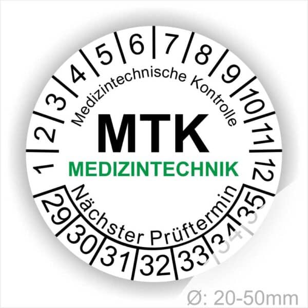 Prüfplakette MTK Medizintechnik rund, Farbe- Weiß, Text "Medizintechnische Kontrolle, MTK MEDIZINTECHNIK Nächster Prüftermin" in Schwarz. Startjahr- 29, Monatszahlen Oben und Jahreszahlen Unten in Kreisform. über den Jahreszahlen Text.
