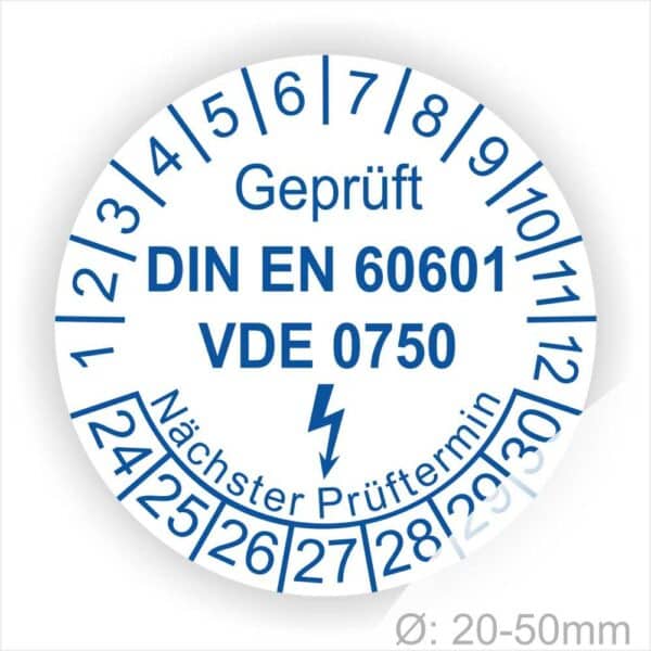 Prüfplaketten rund, Farbe- Weiß, Text "Geprüft DIN EN 60601 und VDE 0750" in Blau danach ein Elektro- Pfeil in Blau, Startjahr- 24, Monatszahlen Oben und Jahreszahlen Unten in Kreisform. Über den Jahreszahlen Text "Nächster Prüftermin"