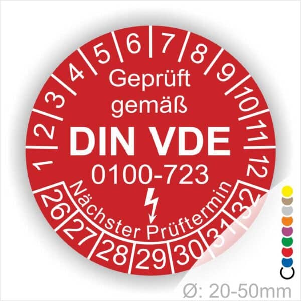 Prüfetiketten rund, Farbe- Rot, Text "Geprüft gemäß VDE 0100-0723" in Weiß danach ein Elektro- Pfeil in Weiß, Startjahr- 26, Monatszahlen Oben und Jahreszahlen Unten in Kreisform. Über den Jahreszahlen Text "Nächster Prüftermin"