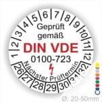 Prüfetiketten rund, Farbe- Weiß, Text "Geprüft gemäß VDE 0100-723" in Schwarz danach ein Elektro- Pfeil in Rot, Startjahr- 26, Monatszahlen Oben und Jahreszahlen Unten in Kreisform. Über den Jahreszahlen Text "Nächster Prüftermin"