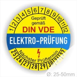 Prüfplaketten rund, Farbe- Gelb in der Mitte ein Streifen in Blau, Text oberer Teil "Geprüft gemäß DIN-VDE" in Schwarz. Mittig Streifen in Blau mit dem Text " ELEKTRO-PRÜFUNG", Danach Elektropfeil in Rot Startjahr- 25, Monatszahlen Oben und Jahreszahlen Unten in Kreisform. Über den Jahreszahlen Text "Nächster Prüftermin"