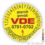 Prüfplaketten rund, Text "geprüft gemäß VDE 0701-0702" Farbe- Gelb Startjahr- 25 mit Elektro Pfeil, Monatszahlen Oben und Jahreszahlen Unten