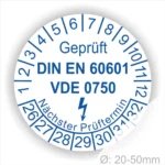Prüfsiegel für elektrische Geräte nach DIN EN 60601 und VDE 0750, mit Angabe des nächsten Prüftermins und einem Durchmesser von 20-50 mm.