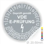 VDE E-Prüfungsplakette mit Prüfintervall und nächstem Prüftermin, geeignet für Geräte mit einem Durchmesser von 20-50 mm.