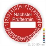 Prüfplakette, Prüfetikett rund, Farbe- Rot, Text "Nächster Prüftermin" in Weiß. Als nächstes kommt ein Beschriftungfeld / Leerfeld in Farbe Weiß. Startjahr- 24, Monatszahlen Oben und Jahreszahlen Unten in Kreisform.