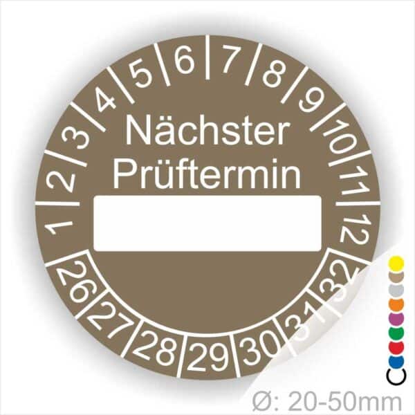 Prüfplakette, Prüfetikett rund, Farbe- Braun, Text "Nächster Prüftermin" in Weiß. Als nächstes kommt ein Beschriftungfeld / Leerfeld in Farbe Weiß. Startjahr- 26, Monatszahlen Oben und Jahreszahlen Unten in Kreisform.