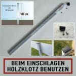 Aluminium-Zaunpfosten mit Montageanleitung und Zubehör, Hinweis zur Verwendung eines Holzklotzes beim Einschlagen, geeignet für die Installation von Zäunen.