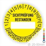 Prüfplakette, Prüfetikett rund, Farbe- Gelb, Text "SICHTPRÜFUNG-BESTANDEN" Schwarz. Als nächstes kommt ein Beschriftungfeld / Leerfeld in Farbe Weiß. Startjahr- 24, Monatszahlen Oben und Jahreszahlen Unten in Kreisform.
