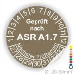 Prüfplaketten, Prüfetiketten rund, Farbe- Braun, Text "Geprüft nach ASR A1.7" in Weiß. Startjahr- 27, Monatszahlen Oben und Jahreszahlen Unten in Kreisform über den Jahreszahlen Text "Nächster Prüftermin".