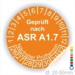 Prüfplaketten, Prüfetiketten rund, Farbe- Orange, Text "Geprüft nach ASR A1.7" in Weiß. Startjahr- 25, Monatszahlen Oben und Jahreszahlen Unten in Kreisform über den Jahreszahlen Text "Nächster Prüftermin".