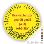 Gelbes Prüfzeichen für Brandschutztüren, das die gesetzliche Prüfung gemäß §4 (3) ArbStättV anzeigt, mit Informationen zum nächsten Prüftermin und einem Durchmesser von 20-50 mm.