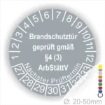 Prüfsiegel für Brandschutztüren mit Informationen zur Prüfung gemäß §4 (3) ArbStättV, einschließlich nächstem Prüftermin und Durchmesserangaben von 20-50 mm.