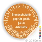 Alt-Text: Prüfplakette für Brandschutztüren mit Angaben zu gesetzlichen Vorschriften gemäß §4 (3) ArbStättV, einschließlich nächstem Prüftermin und Durchmesser von 20-50 mm.