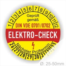 Prüfetiketten, Prüfplakette rund, Farbe- Gelb in der Mitte ein Streifen in Rot, Text oberer Teil "Geprüft gemäß DIN VDE 701/702" in Schwarz. Mittig Streifen in Rot mit dem Text " ELEKTRO-CHECK", danach Elektropfeil in Rot Startjahr- 26, Monatszahlen Oben und Jahreszahlen Unten in Kreisform. Über den Jahreszahlen Text "Nächster Prüftermin"