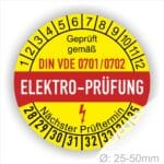 Prüfetiketten, Prüfplaketten rund, Farbe- Gelb in der Mitte ein Streifen in Rot, Text oberer Teil "Geprüft gemäß DIN VDE 0701/0702" in Schwarz. Mittig Streifen in Rot mit dem Text " ELEKTRO-PRÜFUNG", danach Elektropfeil in Rot Startjahr- 28, Monatszahlen Oben und Jahreszahlen Unten in Kreisform. Über den Jahreszahlen Text "Nächster Prüftermin"