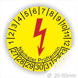 Runde gelbe Elektro-Check Prüfplakette mit rotem Blitzsymbol, Monatsring und Jahresring sowie Aufdruck „Nächster Prüftermin“, Ø 20–50 mm
