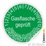 Prüfplaketten, Prüfetikette rund, Farbe- Grün, Text "Gasflasche geprüft" in Weiß. Startjahr- 24, Monatszahlen Oben und Jahreszahlen Unten in Kreisform. Über den Jahreszahlen Text "Nächster Prüftermin"