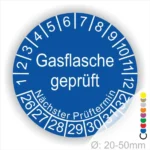 Blaues Prüfzeichen für Gasflaschen mit der Aufschrift "Gasflasche geprüft" und Angaben zum nächsten Prüftermin. Durchmesser von 20-50 mm.