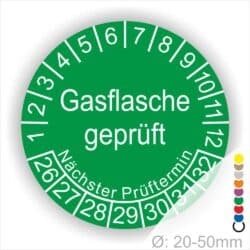 Prüfplaketten, Prüfetikette rund, Farbe- Grün, Text "Gasflasche geprüft" in Weiß. Startjahr- 26, Monatszahlen Oben und Jahreszahlen Unten in Kreisform. Über den Jahreszahlen Text "Nächster Prüftermin"