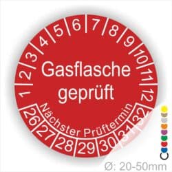 Prüfplaketten, Prüfetikette rund, Farbe- Rot, Text "Gasflasche geprüft" in Weiß. Startjahr- 26, Monatszahlen Oben und Jahreszahlen Unten in Kreisform. Über den Jahreszahlen Text "Nächster Prüftermin"