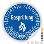 Prüfplaketten, Prüfetiketten rund, Farbe- Blau, Text "Gasprüfung" in Weiß danach eine Flamme als Pictogramm oder Icon in Weiß, Startjahr- 25, Monatszahlen Oben und Jahreszahlen Unten in Kreisform. Über den Jahreszahlen Text "Nächster Prüftermin"