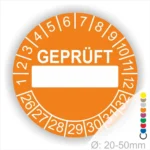 Runde orange Prüfplakette „GEPRÜFT“ mit Beschriftungsfeld, Monatsring und Jahresring zur Kennzeichnung geprüfter Geräte und Anlagen, Ø 20–50 mm
