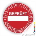 Runde rot Prüfplakette „GEPRÜFT“ mit Beschriftungsfeld, Monatsring und Jahresring zur Kennzeichnung geprüfter Geräte und Anlagen, Ø 20–50 mm.