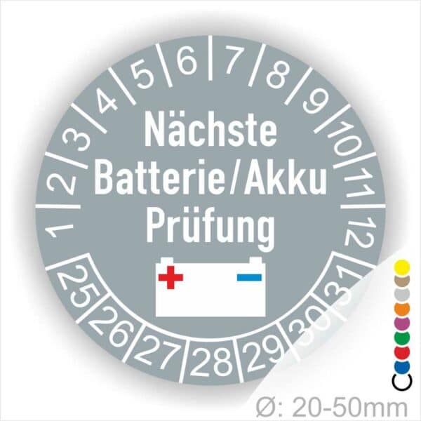 Prüfplaketten, Prüfetiketten rund, Farbe- Grau, Text "Nächste Batterie/Akku Prüfung" in Weiß. Icon Batterie, Startjahr- 25, Monatszahlen Oben und Jahreszahlen Unten in Kreisform.