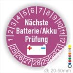 Prüfplaketten, Prüfetiketten rund, Farbe- Lila, Text "Nächste Batterie/Akku Prüfung" in Weiß. Icon Batterie, Startjahr- 25, Monatszahlen Oben und Jahreszahlen Unten in Kreisform.