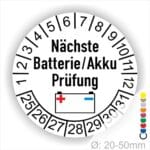 Prüfplaketten, Prüfetiketten rund, Farbe- Weiß, Text "Nächste Batterie/Akku Prüfung" in Schwarz. Icon Batterie, Startjahr- 25, Monatszahlen Oben und Jahreszahlen Unten in Kreisform.