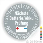 Runde Prüfplakette für die nächste Batterie- oder Akkuprüfung, mit Zahlen von 1 bis 12 und einem Symbol für eine Batterie. Geeignet für Geräte mit einem Durchmesser von 20-50 mm.