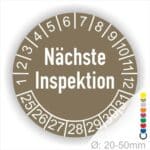 Prüfplaketten, Prüfetiketten rund, Farbe- Braun, Text "Nächste Inspektion" in Weiß. Startjahr- 25, Monatszahlen Oben und Jahreszahlen Unten in Kreisform.