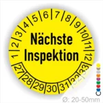 Prüfplaketten, Prüfetiketten rund, Farbe- Gelb, Text "Nächste Inspektion" in Schwarz. Startjahr- 27, Monatszahlen Oben und Jahreszahlen Unten in Kreisform.