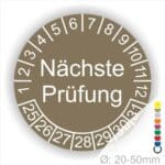 Prüfplaketten, Prüfetiketten rund, Farbe- Braun, Text "Nächste Prüfung" in Weiß. Startjahr- 25, Monatszahlen Oben und Jahreszahlen Unten in Kreisform.