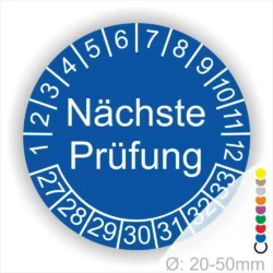 Prüfplaketten, Prüfetiketten rund, Farbe- blau, Text "Nächste Prüfung" in weiß. Startjahr- 27, Monatszahlen Oben und Jahreszahlen Unten in Kreisform.