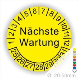 Prüfplaketten, Prüfetiketten rund, Farbe- Gelb, Text "Nächste Wartung" in Schwarz. Startjahr- 25, Monatszahlen Oben und Jahreszahlen Unten in Kreisform.