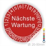 Prüfplaketten, Prüfetiketten rund, Farbe- Rot, Text "Nächste Wartung" in Weiß. Startjahr- 25, Monatszahlen Oben und Jahreszahlen Unten in Kreisform.