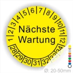 Prüfplaketten, Prüfetiketten rund, Farbe- Gelb, Text "Nächste Wartung" in Schwarz. Startjahr- 28, Monatszahlen Oben und Jahreszahlen Unten in Kreisform.
