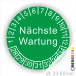 Prüfplaketten, Prüfetiketten rund, Farbe- gruen, Text "Nächste Wartung" in weiß. Startjahr- 28, Monatszahlen Oben und Jahreszahlen Unten in Kreisform.