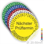 Bunte Prüfmarken mit dem Text "Nächster Prüftermin" in Gelb, umgeben von Zahlen und Farbcodes für verschiedene Prüffristen, geeignet für Durchmesser von 20-50 mm.