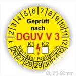 Prüfplakette rund mit Text geprüft nach DGUV Vorschrift 3 danach Ankreuzfeld K1 K2 in Weiß und Text Nächster Prüftermin. Plaketten Farbe- Gelb und Text in Schwarz ausser DGUV in Rot. Monatszahlen oben und Jahreszahlen unten beginnend mit Startjahr- 26. Durchmesser 20-50mm frei wählbar.