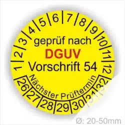 Gelbes Prüfplakett mit der Aufschrift "geprüft nach DGUV Vorschrift 54", das den nächsten Prüftermin anzeigt. Die Skala reicht von 1 bis 12 für die Monate und 1 bis 31 für die Tage, mit einem Durchmesser von 20 bis 50 mm.