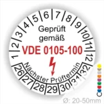 Alt-Text: Prüfplakette für elektrische Geräte gemäß VDE 0105-100 mit Angabe des nächsten Prüftermins und einem Durchmesser von 20-50 mm.