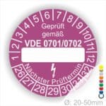 Pruefplakette mit Beschriftungfeld VDE-0701-0702 Farbe- Lila Startjahr- 26 mit Elektro Pfeil Monatszahlen und Jahreszahlen