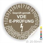 Prüfplaketten rund, Text "geprüft gemäß VDE E-Prüfung" Farbe- Braun Startjahr- 25 mit Elektro Pfeil, Monatszahlen Oben und Jahreszahlen Unten