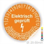 Prüfplaketten rund Farbe- Orange, Text "Elektrisch geprüft" in Weiß danach ein Elektro- Pfeil Startjahr- 25, Monatszahlen Oben und Jahreszahlen Unten in Kreisform
